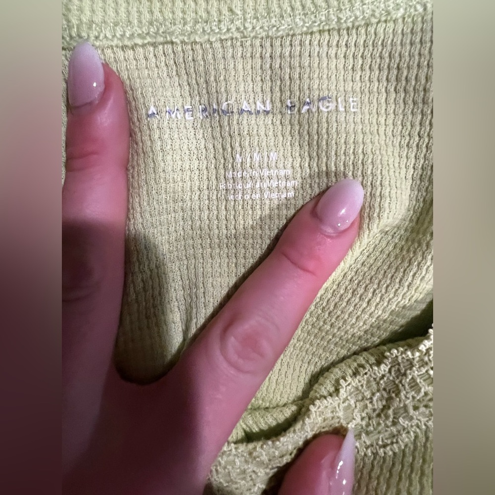 green baby tee
